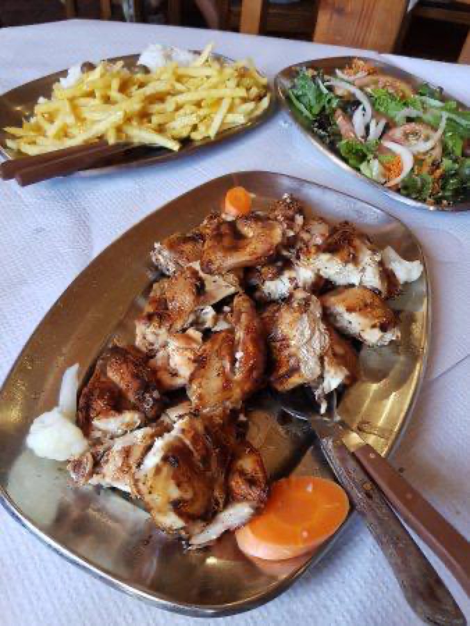 Plated piri-piri grilled chicken at Solar do Sal