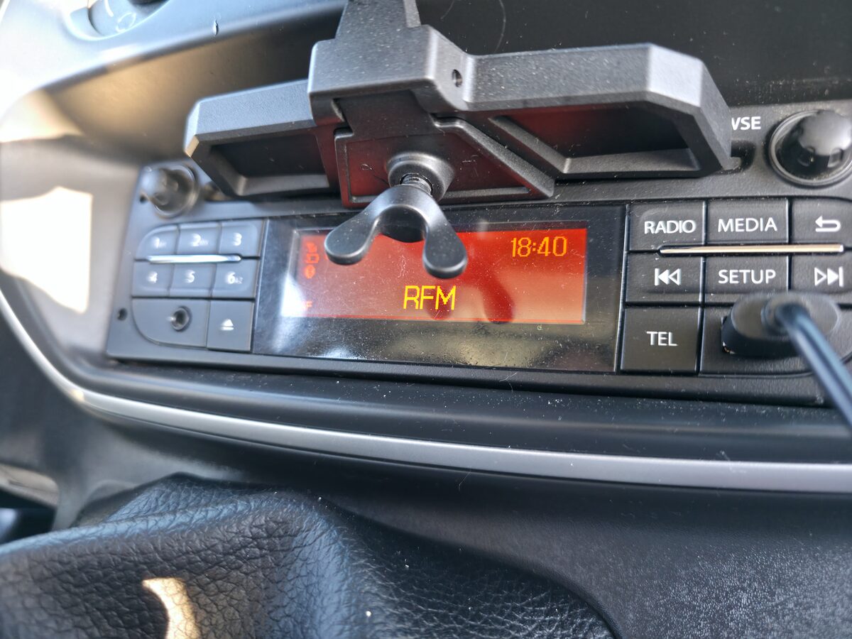 Cockpit radio and phone mount